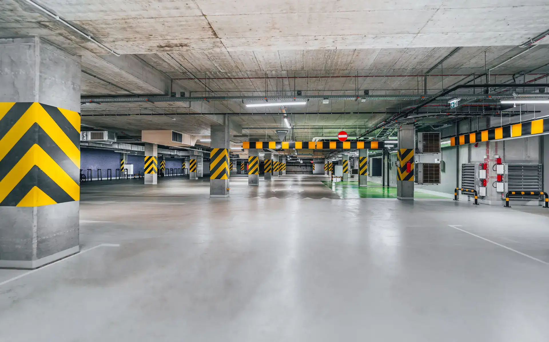 Epoxy-coated concrete floor in a commercial parking garage